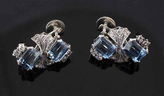 A pair of white gold, aquamarine and diamond ear clips, 0.75in.